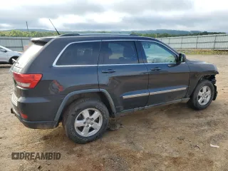 2011 Jeep Grand Cherokee Laredo z VIN 1J4RR4GG0BC518726, wystawiony jako Copart lot #58985765 z przebiegiem 163 625 mil mil oraz Szkoda całkowita • Salvage title. Historia ofert i sprzedaży dostępna na DreamBid. Obrazek 3.