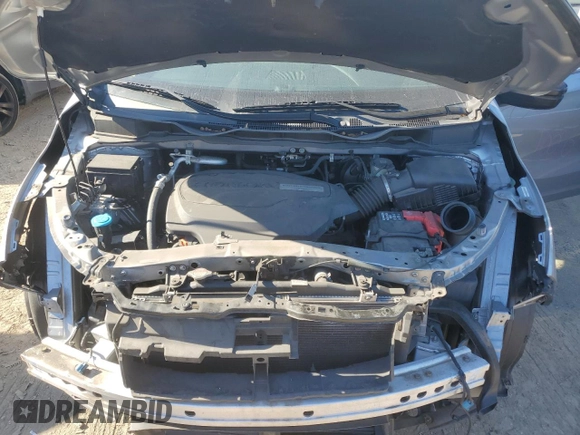 2018 Honda Odyssey LX with VIN 5FNRL6H22JB087152, listed as a Copart auction lot 76754974 with 73,057 mi miles and Salvage Title. Bid and sale history available at carsss.com. Image 12.