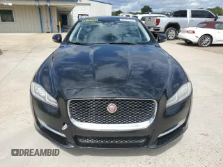 2018 Jaguar XJ with VIN SAJWA1C76J8W14271, listed as a Copart auction lot 73777914 with 124,155 mi miles and Salvage Title. Bid and sale history available at carsss.com. Image 5.