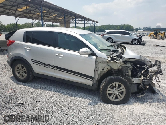 2011 Kia Sportage with VIN KNDPB3A26B7044153, listed as a Copart auction lot 59281175 with Not provided miles and Salvage title. Bid and sale history available at DreamBid. Image 4.