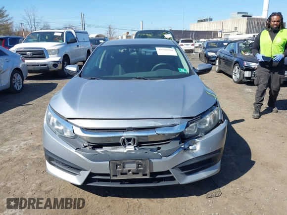 2016 Honda Civic LX with VIN 19XFC2F5XGE230467, listed as a IAAI auction lot 41768980 with 145,592 mi miles. Bid and sale history available at carsss.com. Image 12.