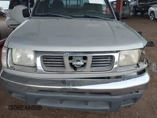 1999 Nissan Frontier XE z VIN 1N6DD26S3XC340419, wystawiony jako IAAI lot #40964630 z przebiegiem 156 431 mil mil oraz . Historia ofert i sprzedaży dostępna na DreamBid. Obrazek 12.