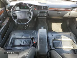 1999 Cadillac DeVille z VIN 1G6KD54Y5XU774986, wystawiony jako Copart lot #50167955 z przebiegiem 151 375 mil mil oraz Czysty tytuł • Clean title. Historia ofert i sprzedaży dostępna na DreamBid. Obrazek 8.