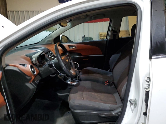 2013 Chevrolet Sonic LT with VIN 1G1JC5SB8D4164658, listed as a Copart auction lot 47059365 with 105,985 mi miles and Salvage Title. Bid and sale history available at DreamBid. Image 7.