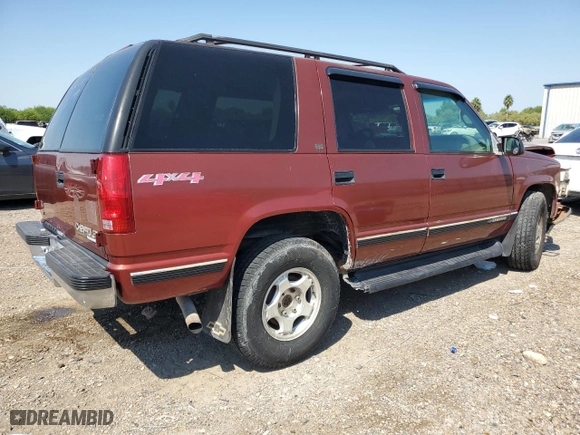 1999 Chevrolet Tahoe Z71 with VIN 1GNEK13R0XJ474557, listed as a Copart auction lot 74971964 with 217,027 mi miles and Salvage Title. Bid and sale history available at carsss.com. Image 3.