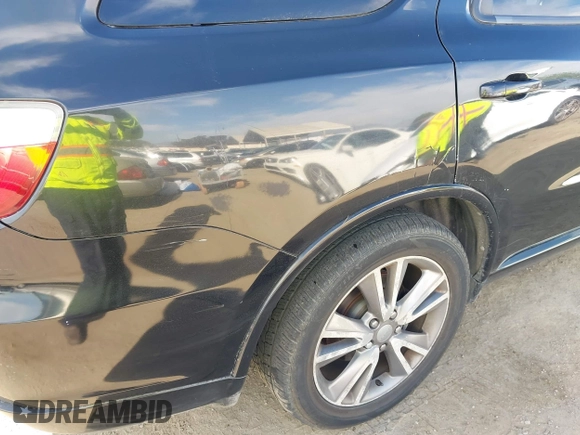 2013 Dodge Durango R/T with VIN 1C4SDHCT2DC530301, listed as a IAAI auction lot 42008853 with 186,148 mi miles and . Bid and sale history available at DreamBid. Image 6.