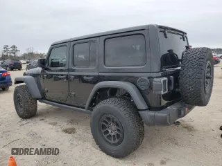 2023 Jeep Wrangler Sport S with VIN 1C4HJXDG6PW695690, listed as a Copart auction lot 45729705 with 1,584 mi miles and Salvage Title. Bid and sale history available at DreamBid. Image 2.