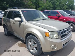 2010 Ford Escape Limited with VIN 1FMCU0E75AKB91097, listed as a IAAI auction lot 42488263 with 201,551 mi miles and . Bid and sale history available at DreamBid. Image 1.