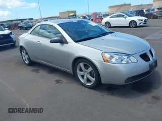 2007 Pontiac G6 GT z VIN 1G2ZH36N874269343, wystawiony jako IAAI lot #42644345 z przebiegiem 124 697 mil mil oraz . Historia ofert i sprzedaży dostępna na DreamBid. Obrazek 1.