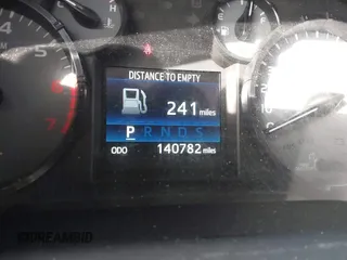 2014 Toyota Tundra 4WD Truck SR with VIN 5TFUM5F17EX051674, listed as a IAAI auction lot 41296906 with 140,782 mi miles. Bid and sale history available at carsss.com. Image 7.