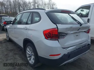 2015 BMW X1 xDrive28i with VIN WBAVL1C59FVY40443, listed as a IAAI auction lot 41777176 with 91,560 mi miles. Bid and sale history available at carsss.com. Image 3.