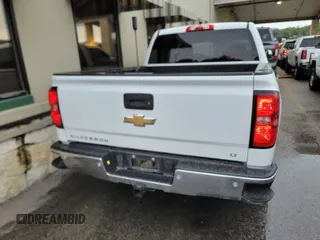 2017 Chevrolet Silverado 1500 LT with VIN 3GCUKREC8HG324467, listed as a IAAI auction lot 42274627 with 169,402 mi miles and . Bid and sale history available at DreamBid. Image 2.