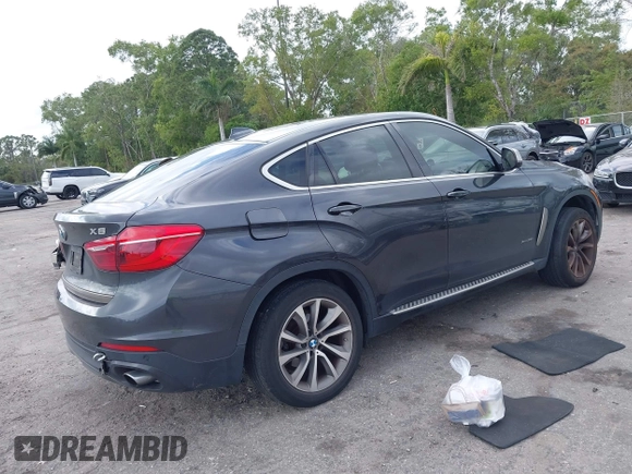 2015 BMW X6 xDrive35i z VIN 5UXKU2C59F0N76242, wystawiony jako IAAI lot #41714644 z przebiegiem 170 851 mil mil oraz . Historia ofert i sprzedaży dostępna na DreamBid. Obrazek 4.