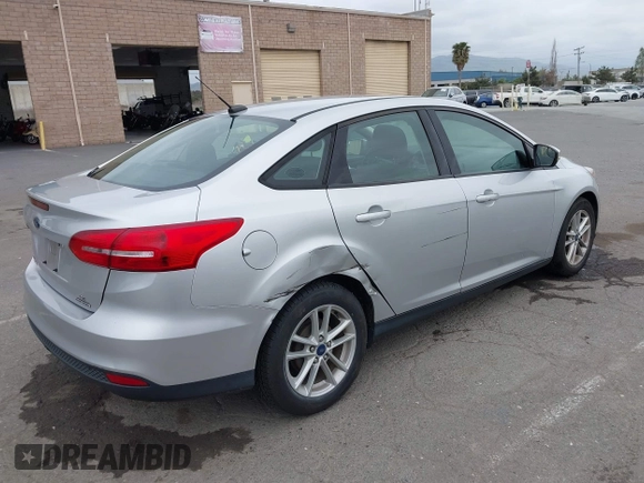 2015 Ford Focus SE z VIN 1FADP3F21FL218369, wystawiony jako IAAI lot #42126986 z przebiegiem 99 844 mil mil oraz . Historia ofert i sprzedaży dostępna na DreamBid. Obrazek 4.