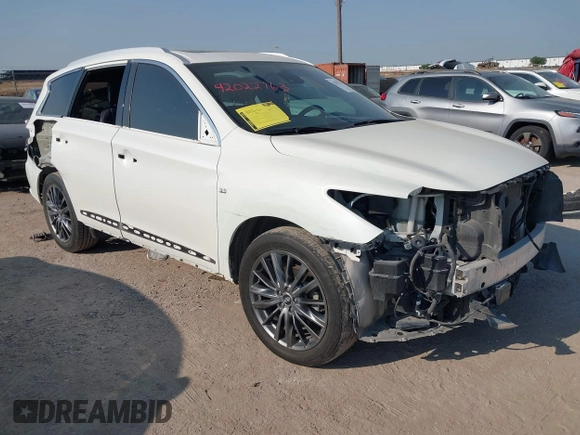 2020 Infiniti QX60 Luxe z VIN 5N1DL0MN7LC525683, wystawiony jako IAAI lot #42022763 z przebiegiem 70 575 mil mil oraz . Historia ofert i sprzedaży dostępna na DreamBid. Obrazek 1.