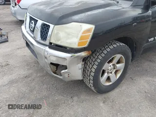 2006 Nissan Titan SE with VIN 1N6BA06A86N570617, listed as a IAAI auction lot 41613217 with 211,095 mi miles and . Bid and sale history available at DreamBid. Image 6.