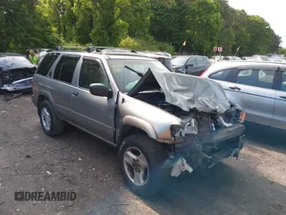 2001 Nissan Pathfinder SE z VIN JN8DR09Y01W610550, wystawiony jako IAAI lot #42318641 z przebiegiem 132 249 mil mil oraz . Historia ofert i sprzedaży dostępna na DreamBid. Obrazek 1.