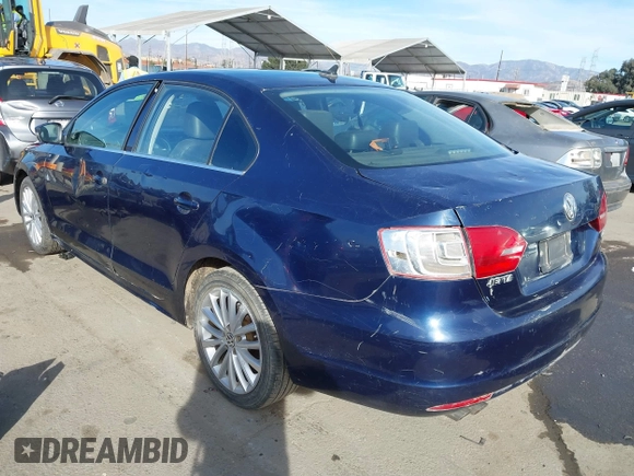 2014 Volkswagen Jetta TDI w/Premium with VIN 3VW3L7AJ7EM367323, listed as a IAAI auction lot 41419079 with 166,511 mi miles and . Bid and sale history available at DreamBid. Image 3.