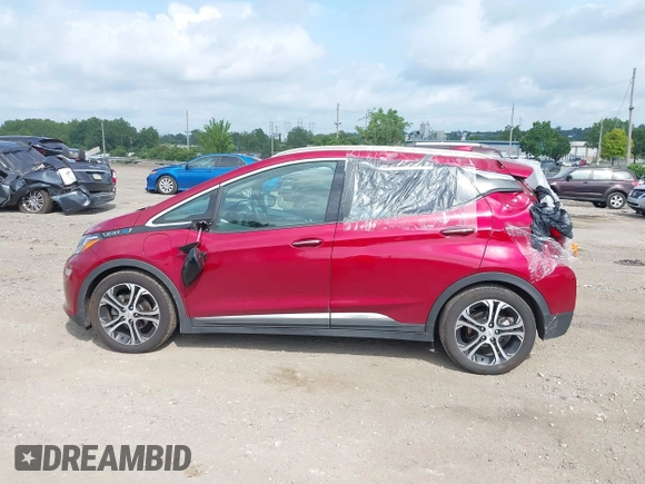 2020 Chevrolet Bolt EV Premier with VIN 1G1FZ6S03L4128822, listed as a IAAI auction lot 42708559 with 38,411 mi miles and . Bid and sale history available at DreamBid. Image 14.