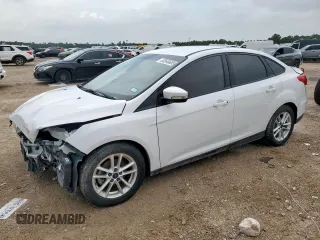 2016 Ford Focus SE with VIN 1FADP3F29GL259317, listed as a Copart auction lot 62646685 with 100,523 mi miles and Salvage title. Bid and sale history available at DreamBid. Image 1.