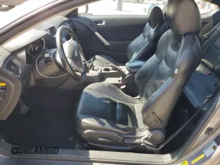2010 Hyundai Genesis Coupe Premium with VIN KMHHT6KD9AU004230, listed as a Copart auction lot 56286055 with 199,511 mi miles and Salvage title. Bid and sale history available at DreamBid. Image 7.