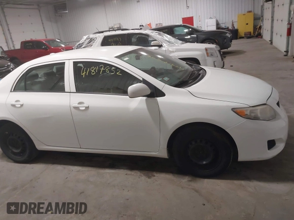 2010 Toyota Corolla z VIN 2T1BU4EE7AC520406, wystawiony jako IAAI lot #41817852 z przebiegiem 127 653 mil mil oraz . Historia ofert i sprzedaży dostępna na DreamBid. Obrazek 13.