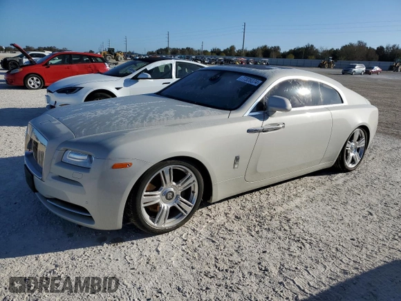2015 Rolls-Royce Wraith z VIN SCA665C52FUX85269, wystawiony jako Copart lot #77326374 z przebiegiem Nie podano mil oraz Szkody całkowita. Historia ofert i sprzedaży dostępna na DreamBid. Obrazek 1.