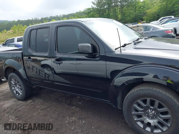2012 Nissan Frontier SV with VIN 1N6AD0ER2CC445761, listed as a IAAI auction lot 42213390 with 162,595 mi miles and . Bid and sale history available at DreamBid. Image 14.