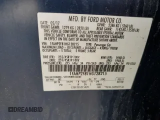 2017 Ford Taurus Limited with VIN 1FAHP2F81HG128215, listed as a Copart auction lot 51997725 with 99,728 mi miles and Salvage Title. Bid and sale history available at DreamBid. Image 12.