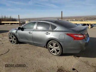2016 Nissan Altima SL z VIN 1N4BL3AP1GC267661, wystawiony jako Copart lot #84277104 z przebiegiem 122 527 mil mil oraz Szkoda całkowita • Salvage title. Historia ofert i sprzedaży dostępna na DreamBid. Obrazek 2.