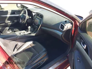 2016 Nissan Maxima Platinum z VIN 1N4AA6AP1GC416590, wystawiony jako IAAI lot #41817288 z przebiegiem 248 514 mil mil oraz . Historia ofert i sprzedaży dostępna na DreamBid. Obrazek 5.