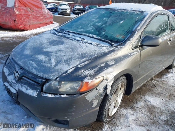2008 Honda Civic Cpe EX-L with VIN 2HGFG12918H518666, listed as a IAAI auction lot 41373407 with 218,852 mi miles. Bid and sale history available at carsss.com. Image 17.