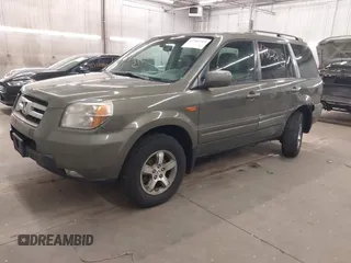 2007 Honda Pilot EX-L z VIN 2HKYF185X7H505077, wystawiony jako IAAI lot #42362215 z przebiegiem 174 592 mil mil oraz . Historia ofert i sprzedaży dostępna na DreamBid. Obrazek 2.