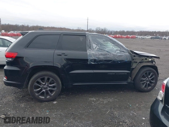 2019 Jeep Grand Cherokee High Altitude with VIN 1C4RJFCG9KC566594, listed as a IAAI auction lot 41128793 with 96,244 mi miles and . Bid and sale history available at DreamBid. Image 13.