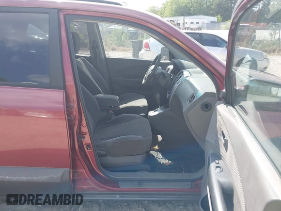 2007 Hyundai Tucson SE with VIN KM8JN12DX7U576110, listed as a IAAI auction lot 42068434 with 147,851 mi miles. Bid and sale history available at carsss.com. Image 5.