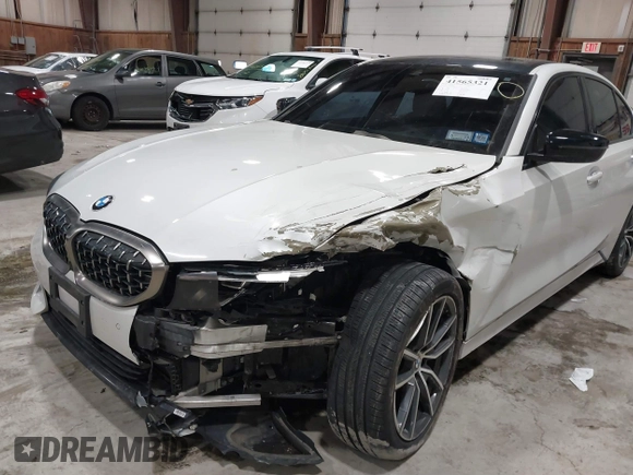 2019 BMW 3 Series 330i xDrive with VIN WBA5R7C55KAJ83482, listed as a IAAI auction lot 41565321 with 126,536 mi miles. Bid and sale history available at carsss.com. Image 6.