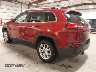 2015 Jeep Cherokee Latitude with VIN 1C4PJMCB4FW687618, listed as a IAAI auction lot 41945132 with 264,782 mi miles and . Bid and sale history available at carsss.com. Image 3.