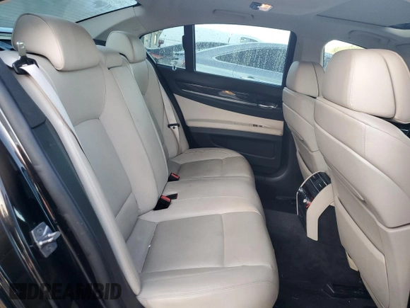 2011 BMW 7 Series 740i with VIN WBAKA4C55BC612987, listed as a Copart auction lot 76607654 with 154,118 mi miles and Salvage Title. Bid and sale history available at carsss.com. Image 10.