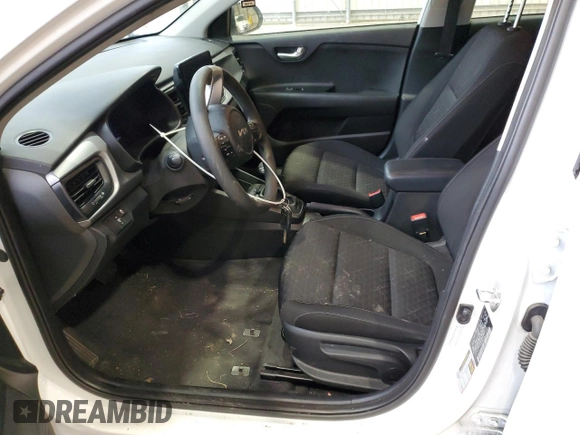2023 Kia Rio LX with VIN 3KPA24ADXPE615843, listed as a Copart auction lot 47660125 with 27,841 mi miles and Salvage Title. Bid and sale history available at DreamBid. Image 7.