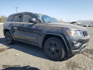 2014 Jeep Grand Cherokee Laredo with VIN 1C4RJEAG7EC212915, listed as a Copart auction lot 70144534 with 169,851 mi miles and Clean Title. Bid and sale history available at carsss.com. Image 4.