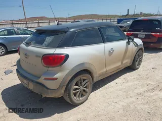 2015 MINI Paceman z VIN WMWSS1C59FWN94932, wystawiony jako IAAI lot #41913769 z przebiegiem 108 678 mil mil oraz . Historia ofert i sprzedaży dostępna na DreamBid. Obrazek 4.