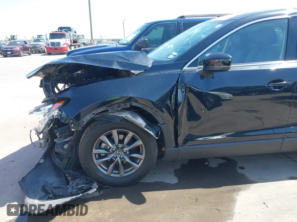 2023 Mazda CX-9 Touring with VIN JM3TCBCY2P0651679, listed as a IAAI auction lot 42002920 with 67,791 mi miles and . Bid and sale history available at DreamBid. Image 19.