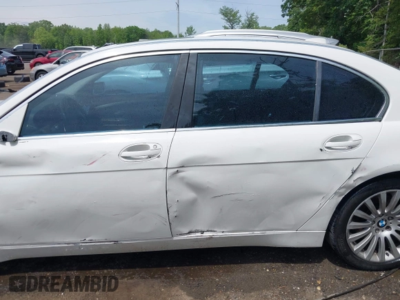 2004 BMW 7 Series 745Li с VIN WBAGN63464DS47181, выставлен на аукционе IAAI как лот 42236487 с пробегом 143 707 миль миль и . История ставок и продаж доступна на DreamBid. Изображение 14.