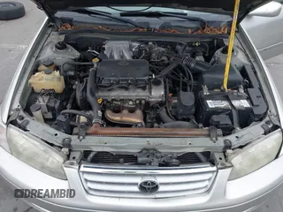 2001 Toyota Camry LE z VIN 4T1BF22K61U126600, wystawiony jako IAAI lot #42175093 z przebiegiem 294 276 mil mil oraz . Historia ofert i sprzedaży dostępna na DreamBid. Obrazek 10.