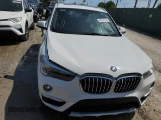 2018 BMW X1 sDrive28i with VIN WBXHU7C38J5H44459, listed as a Copart auction lot 49107553 with 96,494 mi miles. Bid and sale history available at carsss.com. Image 5.
