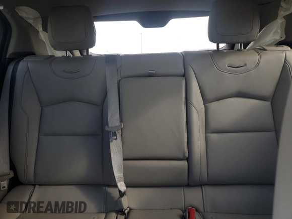 2022 Cadillac XT4 FWD Luxury with VIN 1GYAZAR4XNF121008, listed as a Copart auction lot 77599974 with 29,141 mi miles and Salvage title. Bid and sale history available at DreamBid. Image 10.