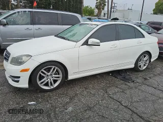 2014 Mercedes-Benz C 250 Sport with VIN WDDGF4HB4EA933398, listed as a Copart auction lot 49122985 with 141,039 mi miles and Clean title. Bid and sale history available at DreamBid. Image 1.