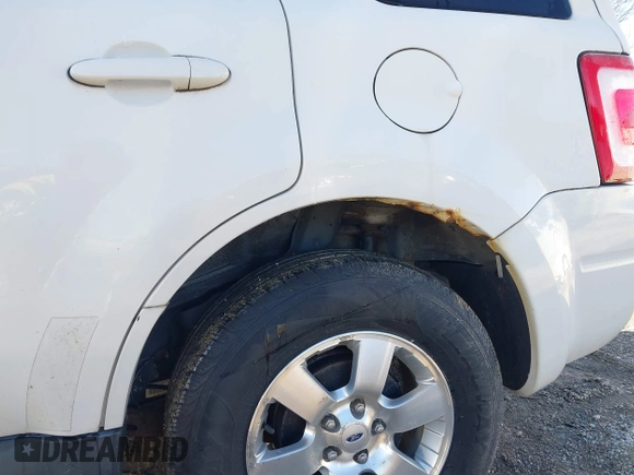 2011 Ford Escape Limited with VIN 1FMCU9EG5BKC09796, listed as a IAAI auction lot 41792944 with 134,117 mi miles. Bid and sale history available at carsss.com. Image 21.