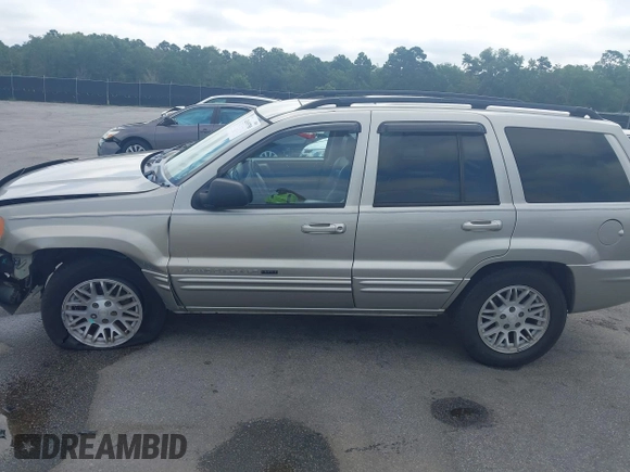 2004 Jeep Grand Cherokee Limited with VIN 1J4GX58SX4C255363, listed as a IAAI auction lot 42619798 with 239,475 mi miles and . Bid and sale history available at DreamBid. Image 14.
