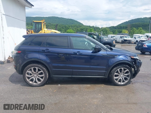 2015 Land Rover Range Rover Evoque Dynamic z VIN SALVT2BG1FH018285, wystawiony jako IAAI lot #42687773 z przebiegiem 92 273 mil mil oraz . Historia ofert i sprzedaży dostępna na DreamBid. Obrazek 14.
